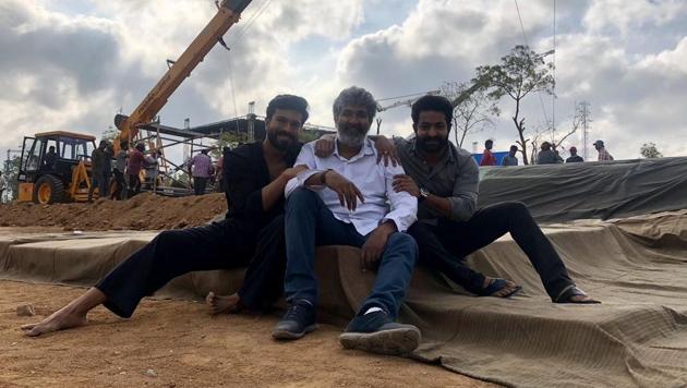 Director SS Rajamouli tweeted a picture with Ram Charan and Jr NTR from the sets of RRR. Director SS Rajamouli tweeted a picture with Ram Charan and Jr NTR from the sets of RRR.