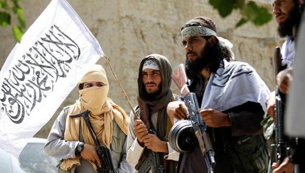 Taliban walk as they celebrate ceasefire in Ghanikhel district of Nangarhar province, Afghanistan June 16, 2018 (REUTERS file photo) Taliban walk as they celebrate ceasefire in Ghanikhel district of Nangarhar province, Afghanistan June 16, 2018 (REUTERS file photo)