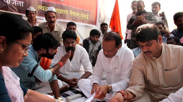 NCP Leader Ajit Pawar and Maharashtra Assembly house Leader Dhananjay Munde during a strike to demand reservation for Marathas, Mumbai, November 13(Bhushan Koyande/HT) NCP Leader Ajit Pawar and Maharashtra Assembly house Leader Dhananjay Munde during a strike to demand reservation for Marathas, Mumbai, November 13(Bhushan Koyande/HT)