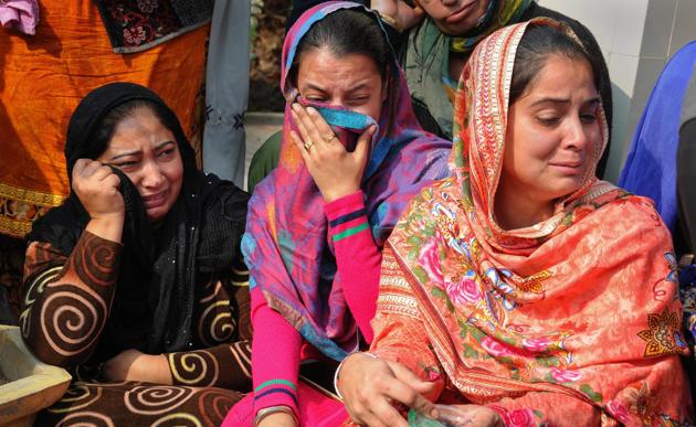 Relatives mourn the death of Sandeep Singh (17), at his funeral, in Amritsar. Three people were killed and over 20 injured when two motorcycle-borne men threw grenade on a religious congregation on inside the Nirankari Bhavan's prayer hall at Adliwal village near Amritsar's Rajasansi on Sunday. (PTI) Relatives mourn the death of Sandeep Singh (17), at his funeral, in Amritsar. Three people were killed and over 20 injured when two motorcycle-borne men threw grenade on a religious congregation on inside the Nirankari Bhavan's prayer hall at Adliwal village near Amritsar's Rajasansi on Sunday. (PTI)