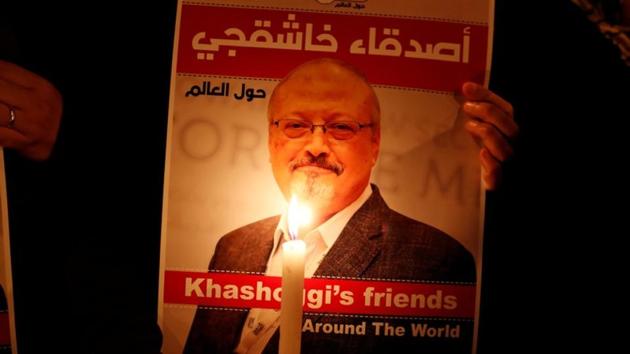 A demonstrator holds a poster with a picture of Saudi journalist Jamal Khashoggi outside the Saudi Arabia consulate in Istanbul, Turkey on October 25. (REUTERS) A demonstrator holds a poster with a picture of Saudi journalist Jamal Khashoggi outside the Saudi Arabia consulate in Istanbul, Turkey on October 25. (REUTERS)