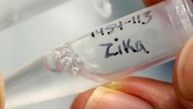 Research scientist Dan Galperin holds vials marked "Zika" during his work on Purified Recombinant Zika Enveloped Protein at the research laboratory where they are working on developing a vaccine for the Zika virus based on production of recombinant variations of the E protein from the Zika virus at the Protein Sciences Inc. headquarters in Meriden, Connecticut, US on June 20, 2016.(REUTERS)
