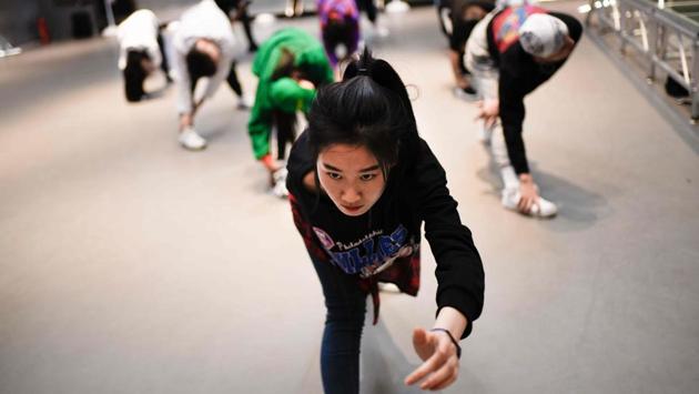 Others in the community agree. “As long as you are not on stage, you have freedom of speech,” said Lian Jiulong, a “bboy” who has been dancing for over 15 years. In 2017, he helped organise and judge a TV show called “Dance Awakening”. All music there had to be approved before launch. “These are the circumstances in China,” he said. (Wang Zhao / AFP)