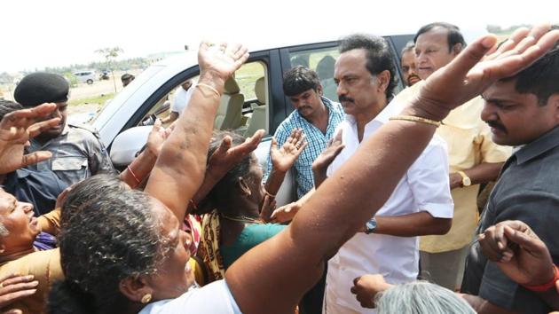 Victims who lost their huts due to cyclone Gaja express their grievances to the leader of opposition M K Stalin at Tharangambadi of Nagapattinam district, Tamil Nadu on Saturday. (HT Photo) Victims who lost their huts due to cyclone Gaja express their grievances to the leader of opposition M K Stalin at Tharangambadi of Nagapattinam district, Tamil Nadu on Saturday. (HT Photo)