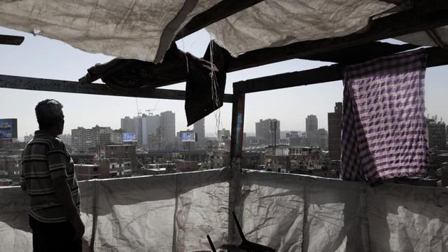 The new capital is the $45 billion brainchild of general-turned-president Abdel-Fattah el-Sissi, his biggest mega-project since taking office in 2014. Ranging from new roads and housing complexes to a Suez Canal expansion, he contends they attract investors and jobs. Senior officials boastfully compare what has been built under el-Sissi to monuments like the Giza Pyramids. (Nariman El-Mofty / AP) The new capital is the $45 billion brainchild of general-turned-president Abdel-Fattah el-Sissi, his biggest mega-project since taking office in 2014. Ranging from new roads and housing complexes to a Suez Canal expansion, he contends they attract investors and jobs. Senior officials boastfully compare what has been built under el-Sissi to monuments like the Giza Pyramids. (Nariman El-Mofty / AP)