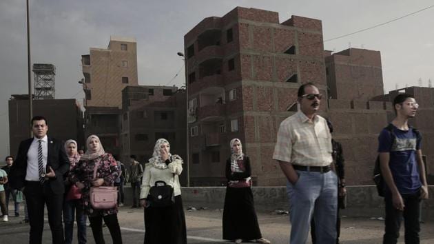 A city of 20 million people that combines charm and squalor, Cairo may soon witness an exodus by some of its well-heeled residents, state employees and foreign embassies to the New Administrative Capital, as the project in the desert is provisionally known. The government argues that Cairo is already bursting at the seams and will grow to 40 million by 2050. (Nariman El-Mofty / AP) A city of 20 million people that combines charm and squalor, Cairo may soon witness an exodus by some of its well-heeled residents, state employees and foreign embassies to the New Administrative Capital, as the project in the desert is provisionally known. The government argues that Cairo is already bursting at the seams and will grow to 40 million by 2050. (Nariman El-Mofty / AP)