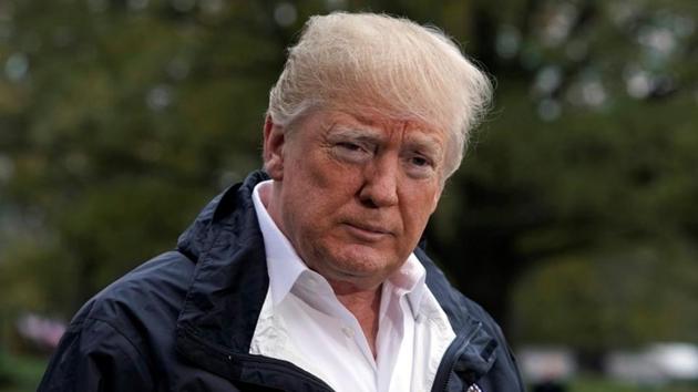 US President Donald Trump talks to the media on the South Lawn of the White House in Washington.(REUTERS)