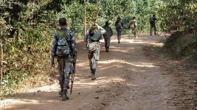 Paramilitary jawans patrol along a road during a band called by Maoists in Lohardaga, Jharkhand on Oct 17.(PTI Photo/Representative image) Paramilitary jawans patrol along a road during a band called by Maoists in Lohardaga, Jharkhand on Oct 17.(PTI Photo/Representative image)