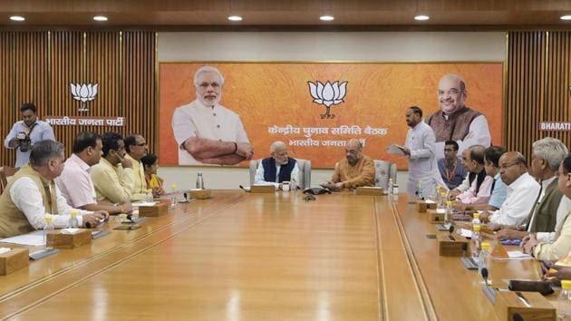 Prime Minister Narendra Modi, BJP President Amit Shah and other leaders during the party's Central Election Committee meeting for the Assembly polls in Mizoram, at party headquarters in New Delhi.(AP Photo)
