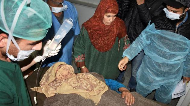 A woman injured in an encounter in Shopian is treated at SMHS hospital in Srinagar. One army soldier and four militants were killed in the encounter that also left three soldiers injured in Jammu and Kashmir’s Shopian early on Tuesday. A police officer said a search operation turned into an encounter after the militants fired on the forces, triggering retaliation. (PTI) A woman injured in an encounter in Shopian is treated at SMHS hospital in Srinagar. One army soldier and four militants were killed in the encounter that also left three soldiers injured in Jammu and Kashmir’s Shopian early on Tuesday. A police officer said a search operation turned into an encounter after the militants fired on the forces, triggering retaliation. (PTI)