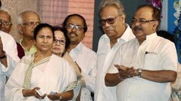 West Bengal Chief Minister Mamata Banerjee with Sovan Chatterjee (right) (PTI File Photo) West Bengal Chief Minister Mamata Banerjee with Sovan Chatterjee (right) (PTI File Photo)