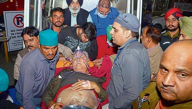 Former chief of AAP’s Amritsar unit Suresh Sharma being shifted to a hospital after he was shot at by an unidentified assailant on Tuesday evening. (Sameer Sehgal/HT Photo) Former chief of AAP’s Amritsar unit Suresh Sharma being shifted to a hospital after he was shot at by an unidentified assailant on Tuesday evening. (Sameer Sehgal/HT Photo)
