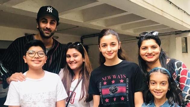 Ranbir Kapoor and Alia Bhatt, Bollywood’s newest couple, pose with fans outside a clinic in Juhu, Mumbai. Ranbir Kapoor and Alia Bhatt, Bollywood’s newest couple, pose with fans outside a clinic in Juhu, Mumbai.