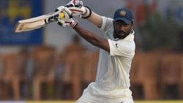 Indian batsman Abhinav Mukund plays a shot during the third day of the first Test match between Sri Lanka and India.(AFP)