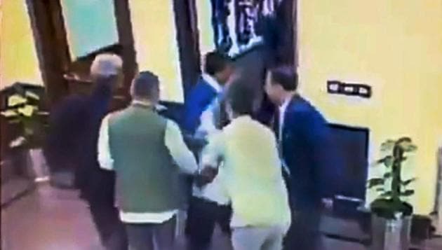 A still from a video posted by the AAP on its twitter account shows Anil Kumar being held after he allegedly threw chilli powder at Delhi Chief Minister Arvind Kejriwal, outside his chamber at Delhi Secretariat in New Delhi, Tuesday, Nov. 20, 2018. (PTI) A still from a video posted by the AAP on its twitter account shows Anil Kumar being held after he allegedly threw chilli powder at Delhi Chief Minister Arvind Kejriwal, outside his chamber at Delhi Secretariat in New Delhi, Tuesday, Nov. 20, 2018. (PTI)