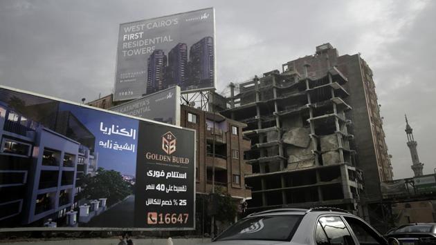 Critics call the new capital a vanity project, arguing its cost could have rebuilt the wrecked economy and refurbished Cairo. They also see it as evidence of el-Sissi’s authoritarianism, launching a multibillion-dollar plan with little debate. He often says Egypt’s resources are limited — leading some, struggling amid skyrocketing prices, to wonder why so much is spent on questionable projects. (Nariman El-Mofty / AP) Critics call the new capital a vanity project, arguing its cost could have rebuilt the wrecked economy and refurbished Cairo. They also see it as evidence of el-Sissi’s authoritarianism, launching a multibillion-dollar plan with little debate. He often says Egypt’s resources are limited — leading some, struggling amid skyrocketing prices, to wonder why so much is spent on questionable projects. (Nariman El-Mofty / AP)