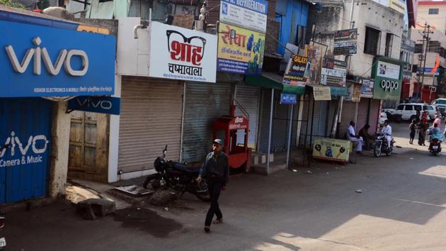 Officials said that by sponsoring advertisement boards in front of mobile shops, companies have violated advertisement rules.(Shankar narayan/ HT Photo)