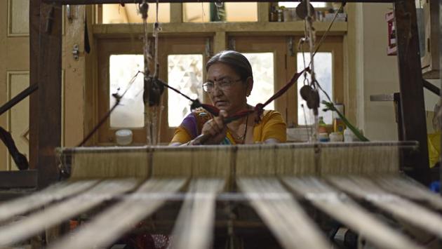 Waning interest among traditional artisans is something Patola shares with Mashru (pictured) – a handloom that was once woven across India but is today believed to be made only in Patan. Even here its production is shrinking. “The number of looms have gone down to 30-35 from 250, three-four decades back,” said Jagdish Khatri. (Sanchit Khanna / HT Photo)