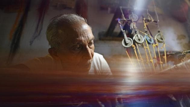 There are few like Maitik Khatri, a master-weaver who is innovating with bags, shoes, interesting prints and embroidery. But few in this generation want to do the actual weaving. One reason for this, according to some, is because earnings pale compared to the work put in - “Rs 100 a day after eight hours of eye-straining work” - said a 68-year-old weaver named Sudhakar. (Sanchit Khanna / HT Photo)