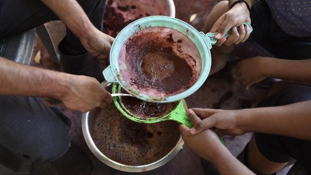 Pigment is prepared as part of the dying process. Another story associated with this weave is that an Indonesian king during a visit to India saw the handloom here and took the art to his country with a decree that only allowed Indonesian royalty to wear this weave. (Sanchit Khanna / HT Photo)