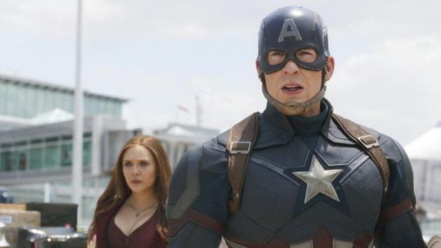 This image released by Disney shows Elizabeth Olsen, left, and Chris Evans in a scene from Marvel's Captain America: Civil War.(AP)