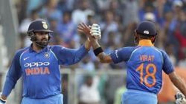 Virat Kohli (L) and Rohit Sharma are currently second and fifth in the list of T20I highest run getters.(AP)