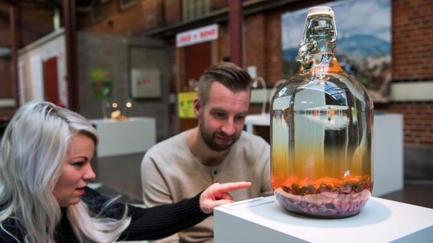 Visitors react to the Baby Mouse Wine from China. Some dishes however, such as the tortoise soup and bat soup, the sheep’s head stew and baby mouse wine remain off limits to even the bravest of visitors. The food that is fresh, such as the cheese, is kept in the fridge for three or four days before being thrown out. (Jonathan Nackstrad / AFP) Visitors react to the Baby Mouse Wine from China. Some dishes however, such as the tortoise soup and bat soup, the sheep’s head stew and baby mouse wine remain off limits to even the bravest of visitors. The food that is fresh, such as the cheese, is kept in the fridge for three or four days before being thrown out. (Jonathan Nackstrad / AFP)