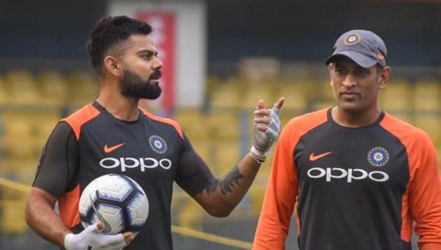File image of Virat Kohli (left) and MS Dhoni. (PTI) File image of Virat Kohli (left) and MS Dhoni. (PTI)