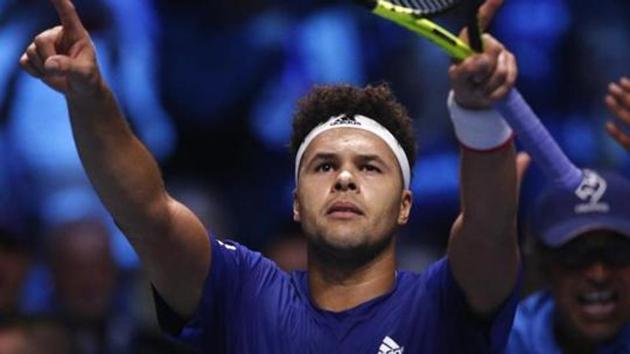 France's Jo-Wilfried Tsonga celebrates after defeating Belgium's Steve Darcis.(AP)