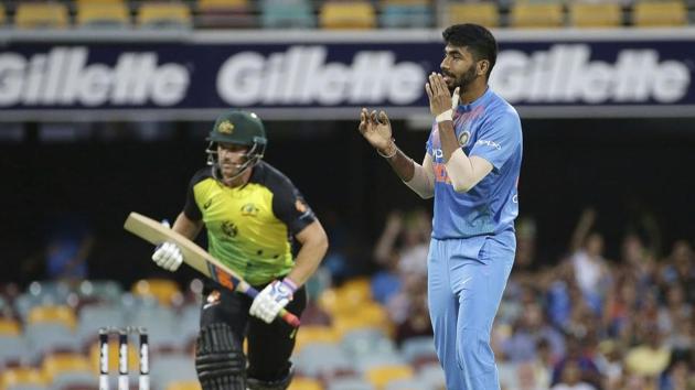 India's Jasprit Bumrah follows the ball during the first T20 International cricket match between Australia and India in Brisbane. (AP)