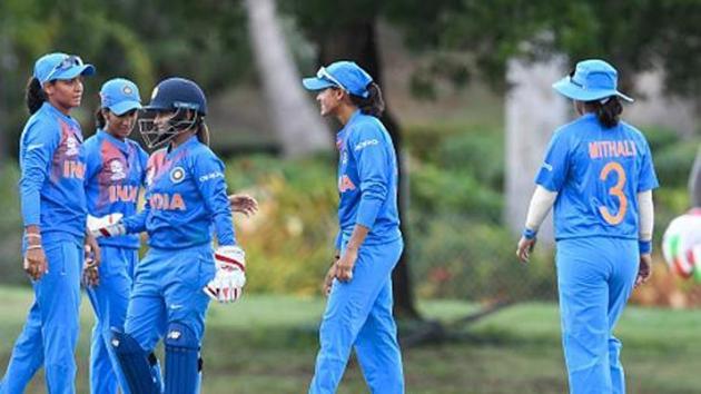 COOLIDGE, ANTIGUA - NOVEMBER 04: Harmanpreet Kaur (L) and Tanya Bhatia (2L) of India celebrates the dismissal of Deandra Dottin (R) of West Indies during a warm-up match at Coolidge Cricket Ground on November 4, 2018 in Coolidge, Antigua and Barbuda. (IDI via Getty Images) COOLIDGE, ANTIGUA - NOVEMBER 04: Harmanpreet Kaur (L) and Tanya Bhatia (2L) of India celebrates the dismissal of Deandra Dottin (R) of West Indies during a warm-up match at Coolidge Cricket Ground on November 4, 2018 in Coolidge, Antigua and Barbuda. (IDI via Getty Images)