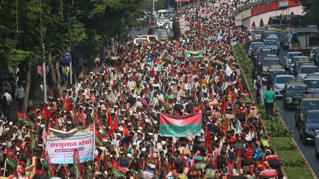 Thousands of farmers and tribals marched to Mumbai after walking nearly 40 km to demand the implementation of measures promised by the Fadnavis government in March last year. The farmers are demanding proper implementation of the loan waiver package and the recommendations of the MS Swaminathan Commission for 50% more than the cost of their crops, land rights for tribal farmers as well as compensation for farm labourers. (REUTERS) Thousands of farmers and tribals marched to Mumbai after walking nearly 40 km to demand the implementation of measures promised by the Fadnavis government in March last year. The farmers are demanding proper implementation of the loan waiver package and the recommendations of the MS Swaminathan Commission for 50% more than the cost of their crops, land rights for tribal farmers as well as compensation for farm labourers. (REUTERS)