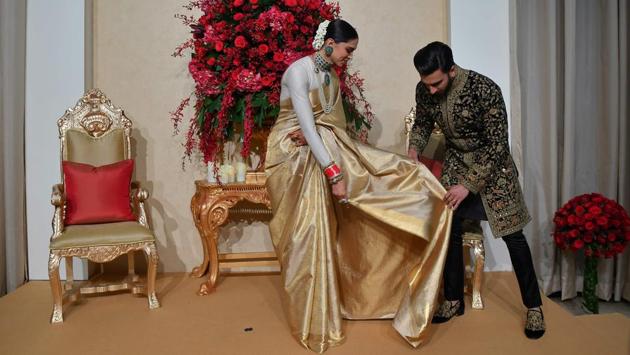 Bollywood actors Ranveer Singh and Deepika Padukone pose for photographs during their wedding reception held at the Leela Palace in Bangalore, Karnataka on November 21, 2018. (Manjunath Kiran / AFP) Bollywood actors Ranveer Singh and Deepika Padukone pose for photographs during their wedding reception held at the Leela Palace in Bangalore, Karnataka on November 21, 2018. (Manjunath Kiran / AFP)