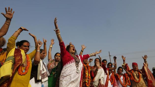 Lakshmi Narayan Tripathi (C), who heads an order of Indian transgender seers along with her followers as she performs rituals ahead of Kumbh Mela in Prayagraj on November 20, 2018. (Rajesh Kumar Singh / AP) Lakshmi Narayan Tripathi (C), who heads an order of Indian transgender seers along with her followers as she performs rituals ahead of Kumbh Mela in Prayagraj on November 20, 2018. (Rajesh Kumar Singh / AP)