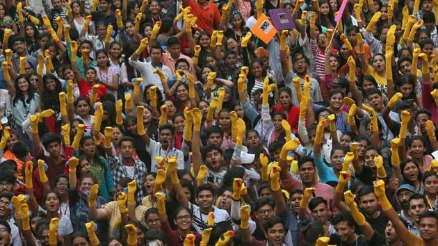 Participants cheer as they attempt to create a new Guinness world record for most people wearing sock puppets at a single venue, inside a college premises in Mumbai, Maharashtra on November 22, 2018. (Francis Mascarenhas / REUTERS) Participants cheer as they attempt to create a new Guinness world record for most people wearing sock puppets at a single venue, inside a college premises in Mumbai, Maharashtra on November 22, 2018. (Francis Mascarenhas / REUTERS)