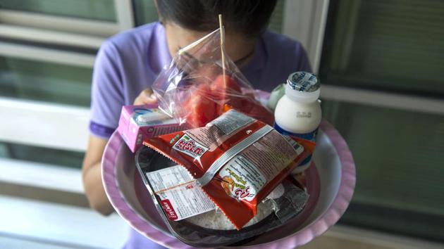 “If they eat our food and are satisfied, we feel comfort that that food will be transferred to our loved ones,” said Prachaksvich Lebnak, deputy secretary general at the National Health Security Office. “Some people even give monks cigarettes,” he added, in a symbolic offering to ancestors who were heavy smokers. (Romeo Gacad / AFP) “If they eat our food and are satisfied, we feel comfort that that food will be transferred to our loved ones,” said Prachaksvich Lebnak, deputy secretary general at the National Health Security Office. “Some people even give monks cigarettes,” he added, in a symbolic offering to ancestors who were heavy smokers. (Romeo Gacad / AFP)