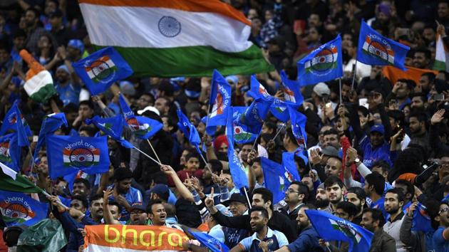 Indian fans cheer during the Twenty20 international cricket match between India and Australia. (AP) Indian fans cheer during the Twenty20 international cricket match between India and Australia. (AP)