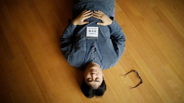 A participant meditates before being locked up in a cell. “He said he would rather go into solitary confinement for a week to take a rest and feel better,” Noh said. “That was the beginning.” (Kim Hong-Ji / REUTERS) A participant meditates before being locked up in a cell. “He said he would rather go into solitary confinement for a week to take a rest and feel better,” Noh said. “That was the beginning.” (Kim Hong-Ji / REUTERS)