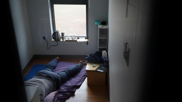 A participant takes a nap inside a cell. A downturn in South Korea’s high-tech, export-driven economy has intensified a hyper-competitive school and work environment that experts say adds to a high incidence of stress and suicide. (Kim Hong-Ji / REUTERS) A participant takes a nap inside a cell. A downturn in South Korea’s high-tech, export-driven economy has intensified a hyper-competitive school and work environment that experts say adds to a high incidence of stress and suicide. (Kim Hong-Ji / REUTERS)