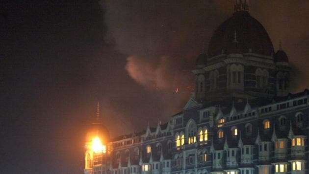 Fire and smoke is seen during an attack at the Taj Mahal Palace hotel in Mumbai on November 26, 2008.(AFP File Photo)