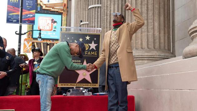 Rappers Pharrell Williams (L) and Snoop Dogg attend a ceremony honouring Snoop Dogg with a Star on Hollywood Walk of Fame, in Hollywood, California. (Valerie Macon / AFP) Rappers Pharrell Williams (L) and Snoop Dogg attend a ceremony honouring Snoop Dogg with a Star on Hollywood Walk of Fame, in Hollywood, California. (Valerie Macon / AFP)
