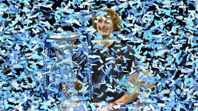 Germany’s Alexander Zverev is covered in ticker tape after being presented with the trophy, having beat Serbia’s Novak Djokovic in their men;s singles final match on day eight of the ATP World Tour Finals tennis tournament at the O2 Arena in London, England. (Glyn Kirk / AFP) Germany’s Alexander Zverev is covered in ticker tape after being presented with the trophy, having beat Serbia’s Novak Djokovic in their men;s singles final match on day eight of the ATP World Tour Finals tennis tournament at the O2 Arena in London, England. (Glyn Kirk / AFP)