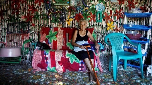 Maria Bersabe Ponce, 87, sits inside her house made out of plastic bottles in the village of El Borbollon in El Transito, El Salvador. (Jose Cabezas / REUTERS) Maria Bersabe Ponce, 87, sits inside her house made out of plastic bottles in the village of El Borbollon in El Transito, El Salvador. (Jose Cabezas / REUTERS)