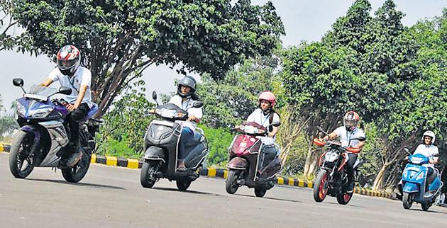 Ajeenkya DY Patil University (ADYPU) has taken the lead and has become 100 per cent helmet- complaint university by implementing compulsory helmets for students, staff and faculty. (HT PHOTO) Ajeenkya DY Patil University (ADYPU) has taken the lead and has become 100 per cent helmet- complaint university by implementing compulsory helmets for students, staff and faculty. (HT PHOTO)