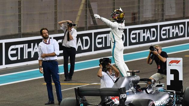 Mercedes' British driver Lewis Hamilton celebrates after taking the pole position in the qualifying session at the Yas Marina circuit on November 24, 2018, in Abu Dhabi, ahead of the Abu Dhabi Formula One Grand Prix (AFP) Mercedes' British driver Lewis Hamilton celebrates after taking the pole position in the qualifying session at the Yas Marina circuit on November 24, 2018, in Abu Dhabi, ahead of the Abu Dhabi Formula One Grand Prix (AFP)