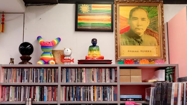 Books lie on shelves at Gin Gin bookshop, a hub for LGBT rights activists. “There’s no need to protect gay marriage...The younger generation has their own ideas, but I disagree regardless of what they say,” she said. Rights activists say the conservative referendum is “discriminatory” as it goes against a 2017 court ruling that current laws violate the right to freedom of marriage and equality. (Ann Wang / REUTERS)