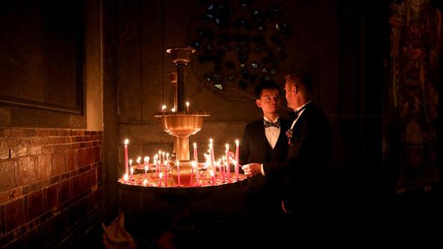John Sugden (R) and Kao Shaochun look at each other during their pre-wedding photoshoot. “I hope Tsai Ing-wen could undertake the leadership responsibility. The issue has been delayed for so long due to a lack of policy direction from the ruling party,” said Jennifer Lu, co-ordinator of the Marriage Equality Coalition Taiwan. “The government should protect the rights of marriage for all Taiwanese.” (Ann Wang / REUTERS)