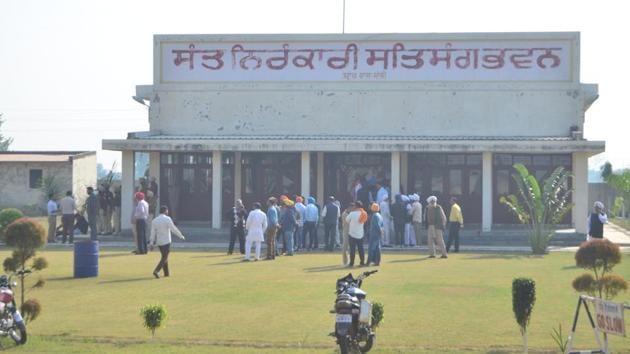 Members of the Nirankari spiritual group stand outside a building following the grenade attack at the Nirankari Satsang Bhawan centre, at Adliwal village, near Rajasansi, Amritsar on November 18. (HT File Photo) Members of the Nirankari spiritual group stand outside a building following the grenade attack at the Nirankari Satsang Bhawan centre, at Adliwal village, near Rajasansi, Amritsar on November 18. (HT File Photo)