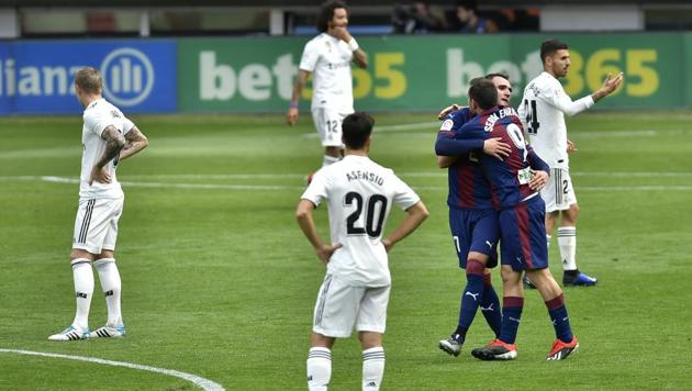 Deportivo SD Eibar's Sergi Enrich, second right, celebrates after scoring his team's second goal of the game during the Spanish La Liga soccer match between Real Madrid and SD Eibar at Ipurua stadium (AP) Deportivo SD Eibar's Sergi Enrich, second right, celebrates after scoring his team's second goal of the game during the Spanish La Liga soccer match between Real Madrid and SD Eibar at Ipurua stadium (AP)