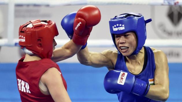 Mary Kom (right) in action against Ukraine's Hanna Okhota during the final match of women's light flyweight 45-48 kg bout at AIBA Women's World Boxing Championships.(PTI)